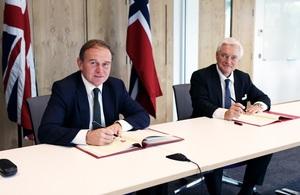 Environment Secretary George Eustice signs the UK - Norway Fisheries Agreement.