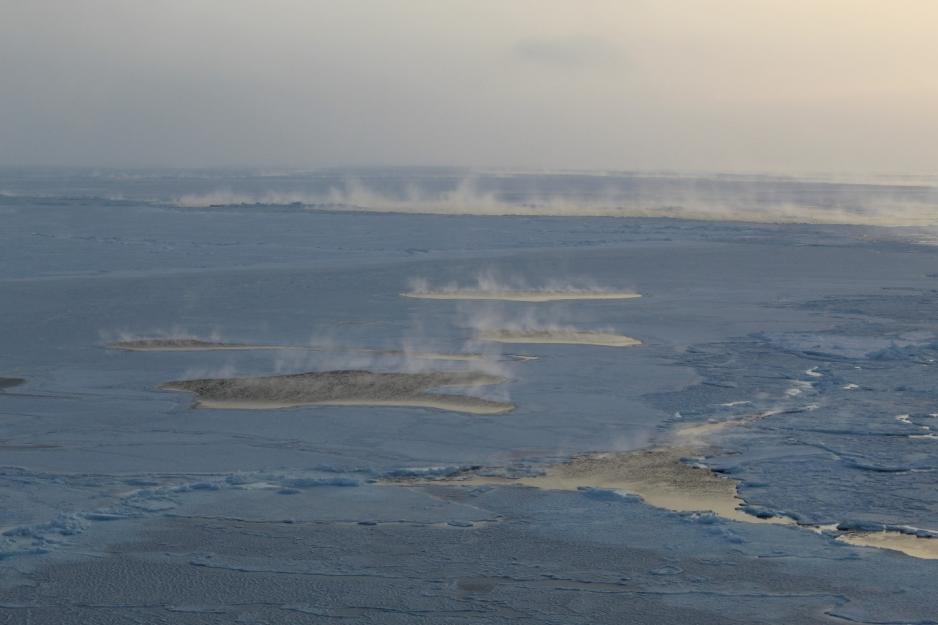 Sea smoke over leads and cracks in the sea ice covered area of the Barents Sea, March 2021.