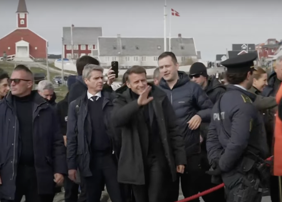 French President Macron and Greenlandic Premier Nielsen walking to the joint press conference in Nuuk, Greenland. (Source: APT News/screenshot) macron in greenland