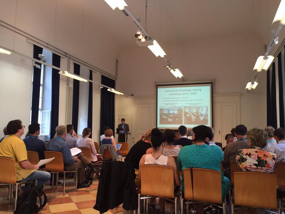 Petrov presenting Arctic-FROST milestones. (Photo Credit: Emily Francis)