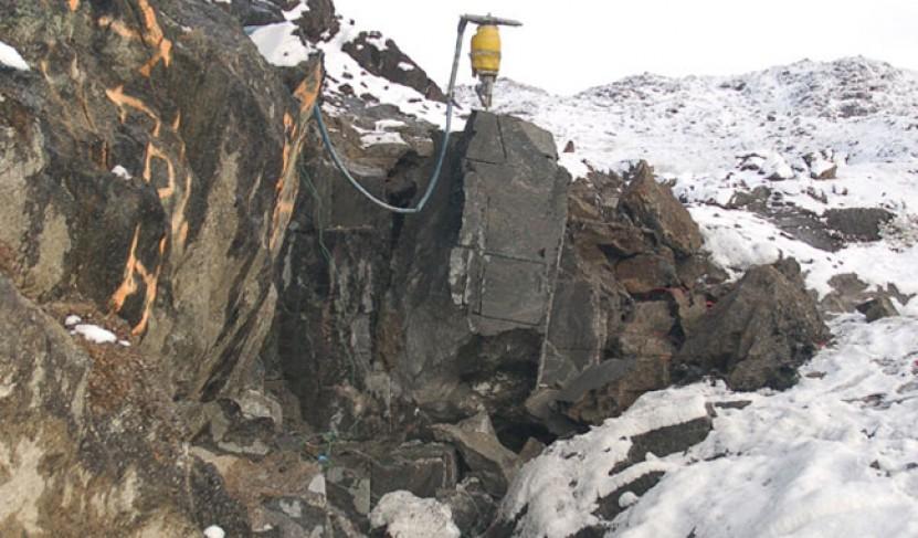 Rough conditions and heavy equipment, and then again, just another industry, Mr. Houghton says. (Photo by TNG).
