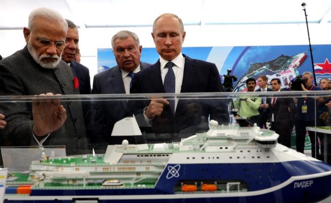 Russian President Vladimir Putin, Indian Prime Minister Narendra Modi, and Rosneft CEO and Chairman Igor Sechin at the Zvezda Shipyard in Bolshoi Kamen, Russia.