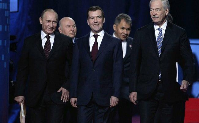 Then party leader Vladimir Putin with Yury Luzhkov, Dmitry Medvedev, Sergey Shoygu and Boris Gryzlov in 2009 at the 11th United Russia Party Congress.
