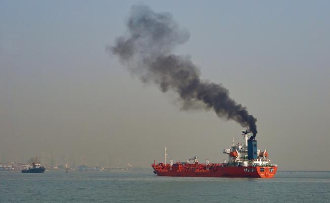 Cargo ship emitting black carbon Cargo ship emitting black carbon