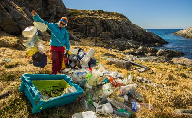 Marine litter, including foreign bottles & cans along Norway’s Arctic coastline outside Tromsø. (Source: Bo Eide under CC BY-NC-ND 2.0) litter