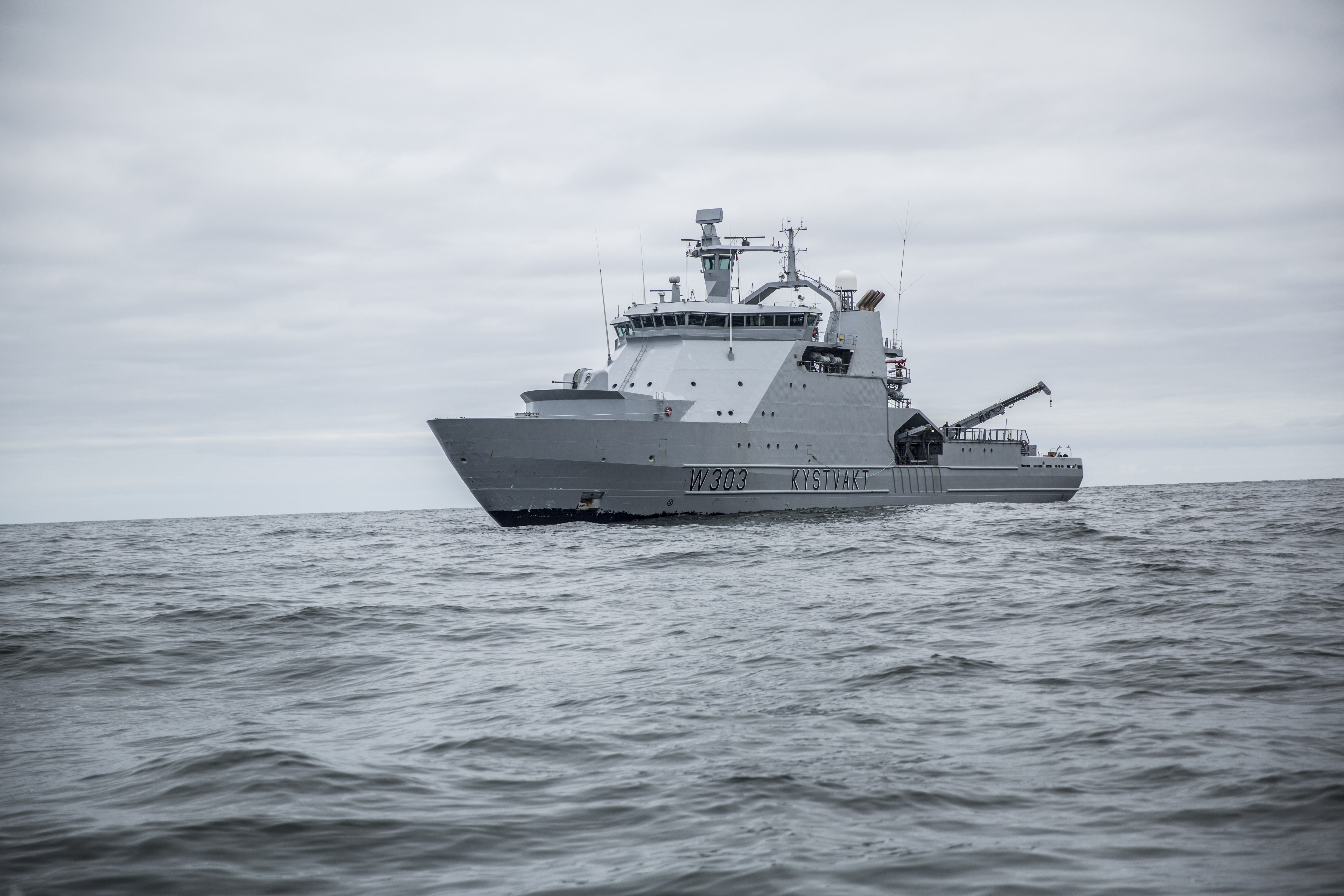 KV Svalbard last January arrested the Latvian vessel “Senator” for illegally catching snow crab in the protected zone near Svalbard. (Photo: Olav Standal Tangen/Norwegian Armed Forces)