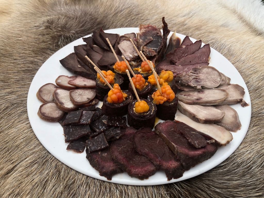 A sample of the traditional foods made and brought to the Ceremony by the EALLU team. (Photo Credit: International Centre for Reindeer Husbandry (ICR))